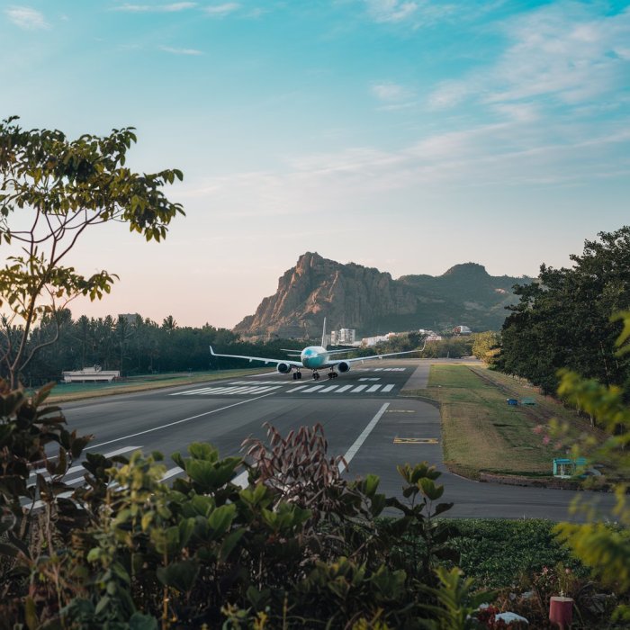 Should you take a car seat on the plane? Pros, cons & travel tips