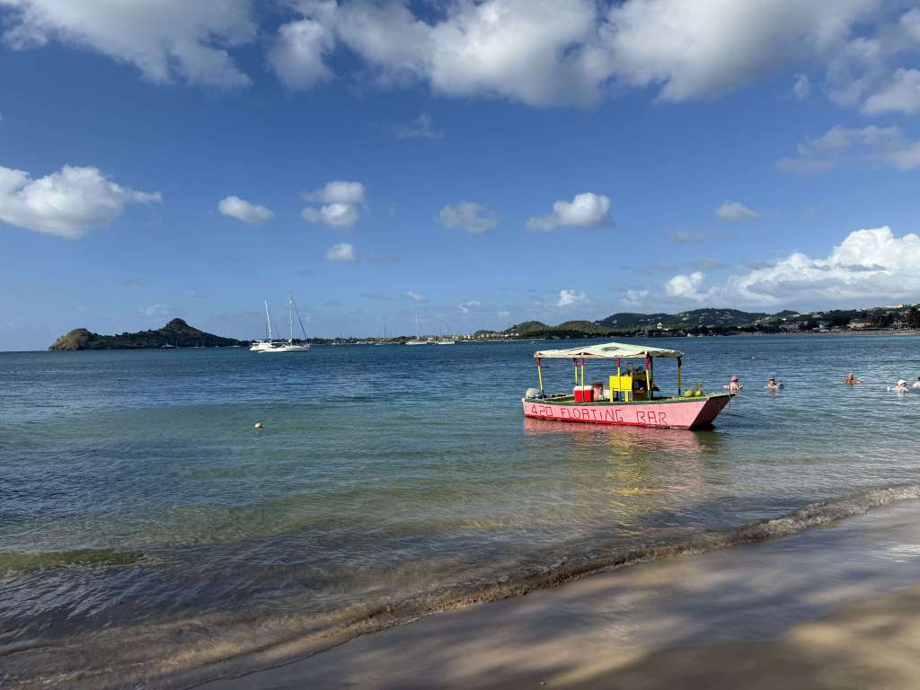 Floating bar off the coast of Saint Lucia, offering a unique way to enjoy cocktails while relaxing on the crystal-clear beach.