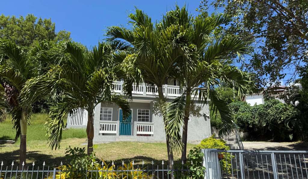 Cozy and comfortable self-catering Airbnb apartment in Saint Lucia, perfect for family stays with kitchen and toddler-friendly layout.