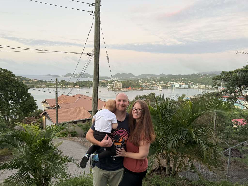 Scenic viewpoint in Saint Lucia captured shortly after landing, with winding roads ahead—showcasing why a car seat is essential for family travel.