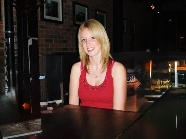 A childhood photo of the author, looking thoughtful and slightly uncertain, dressed casually with a hint of curiosity in her expression.