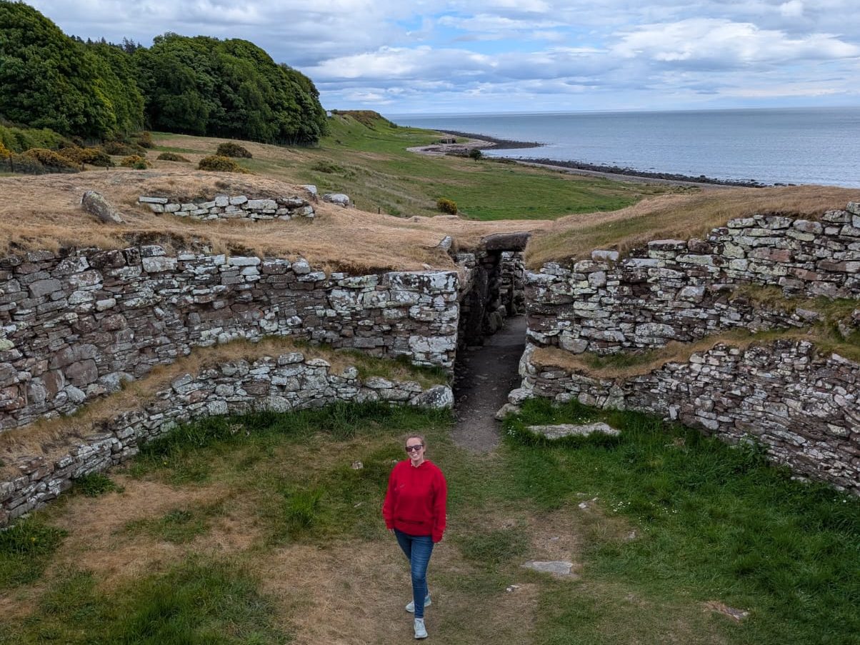 Standing inside the ancient stone circle at Cairn Liath on the North Coast 500