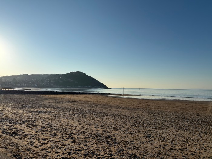Peaceful beach scene representing stillness, healing, and quiet reflection
